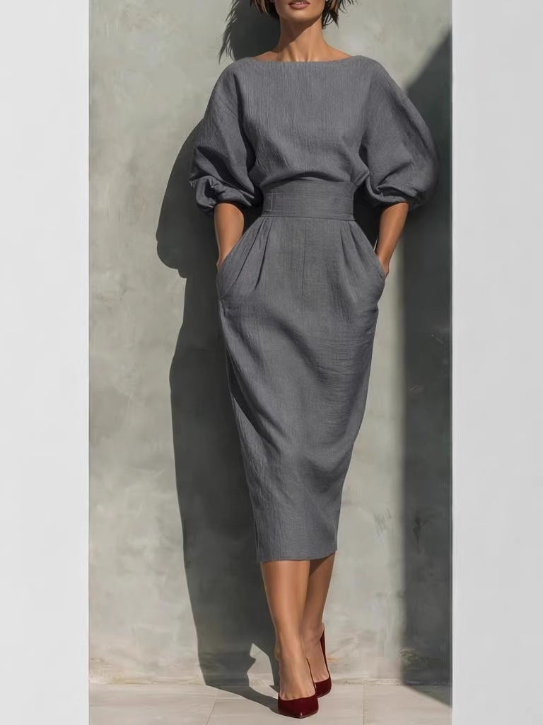 Spring and Autumn Style Women's Elegant Boat-Neck A-Line Dress with Puff-Sleeve Top and High-Waisted Pleated Skirt, Showcasing a Vintage Look