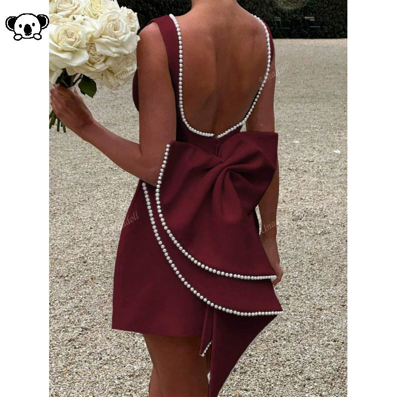 P 22476 Pearl Bow Backless A-line Dress